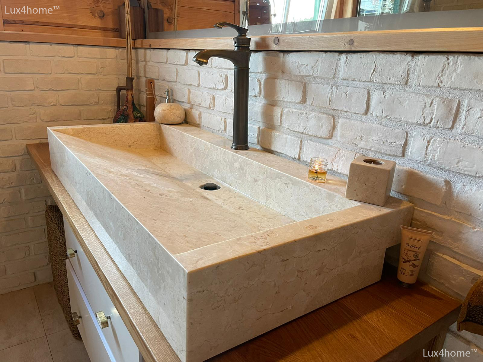 Marbel counter top sink in a lovely bathroom